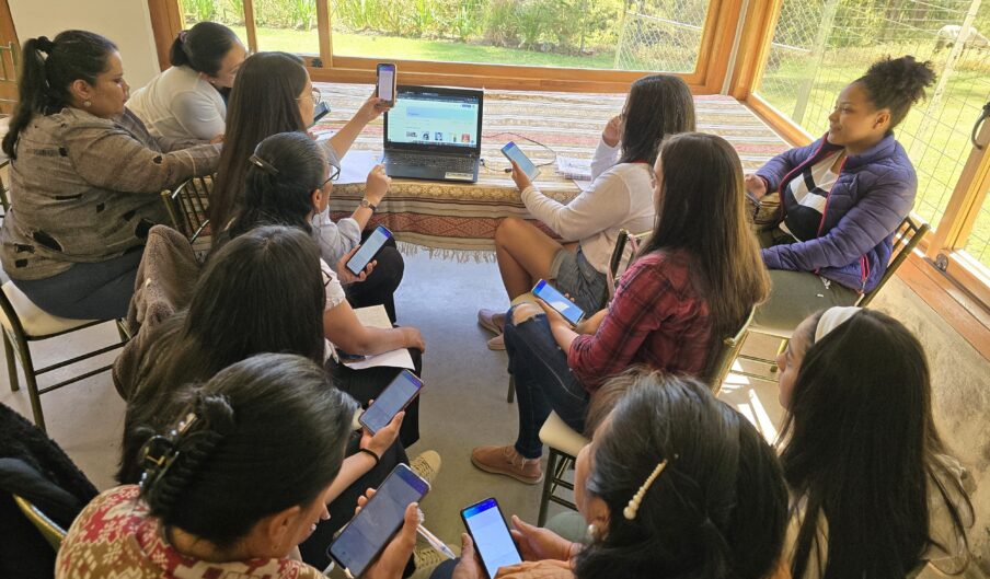 Group of women on their mobile phones.